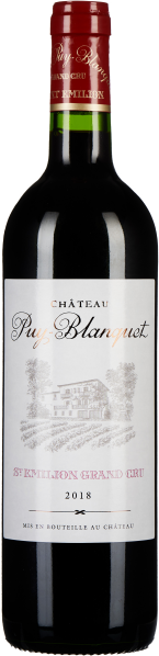 Rotweinflasche mit elegantem Etikett und rotem Kapselverschluss.