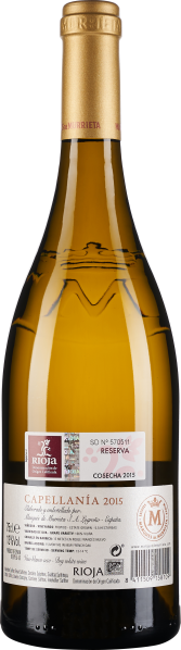 Goldenes Weinetikett auf grünlich-transparentem Flasche mit goldener Kappe.