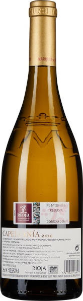 Goldene Weinflasche mit elegantem Etikett, reflektierender Oberfläche.