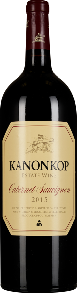 Dunkle Weinflasche mit elegantem, cremefarbenem Etikett und rotem Flaschenhals.