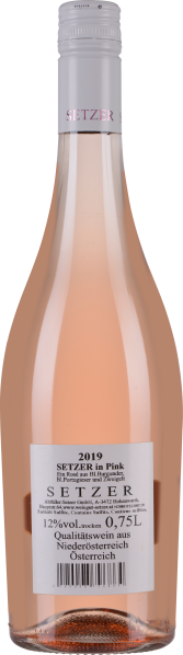 Roséwein in klarer Flasche, blass-pinkes Getränk, silberner Schraubverschluss.