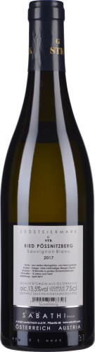 Grüne Weinflasche mit dunkelblauem Hals, weißem Etikett und goldener Schrift.