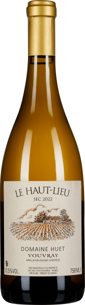 Goldene Weinflasche mit elegantem Etikett und illustriertem Weingut.