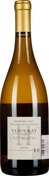 Klares Glas mit weißem Etikett, goldener Verschluss, elegantes Design.