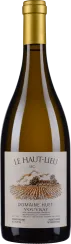 Braune Flasche mit goldener Kapsel, elegantes Etikett mit Landschaftszeichnung in Sepiatönen.