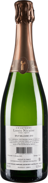 Grüne Champagnerflasche mit rosegoldener Folie und detailliertem Etikett auf der Rückseite.