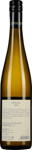 Schlanke Weinflasche mit schwarzem Schraubverschluss und hellem Etikett.