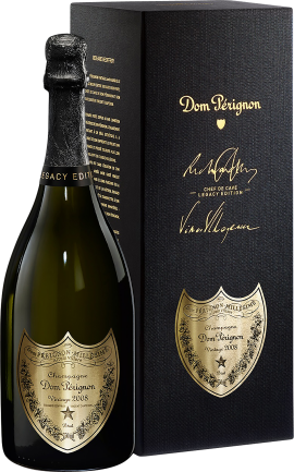 Champagnerflasche mit goldenen Etiketten, schwarze Geschenkbox daneben.