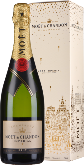 Grüne Schaumweinflasche mit goldener Kapsel und verzierter Champagnerverpackung.