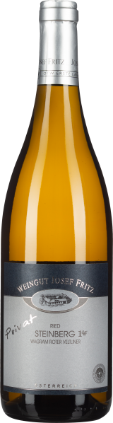 Große Flasche mit silbernem Etikett und goldenem Inhalt, elegante Optik.