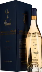Roséweinflasche mit elegantem, transparentem Glas und goldener Akzentkappe vor einer luxuriösen, dunkelblauen Verpackungsbox.