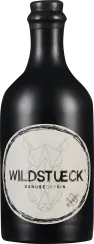 Mattschwarze Flasche im eleganten Design mit rundem Etikett. Das Etikett zeigt ein geometrisches Tiermotiv und stilisierte Schriftzüge.