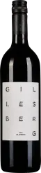 Dunkle Weinflasche mit schlichtem, weißem Etikett, das einzelne Buchstaben in minimalistischer Anordnung zeigt. Schwarzer Schraubverschluss rundet das moderne Design ab.