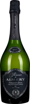 Grüne, schlanke Flasche mit edlem, dunklem Etikett und goldener Schrift, verziert mit floralem Muster. Der Flaschenhals ist mit schwarzem Folienverschluss umwickelt.