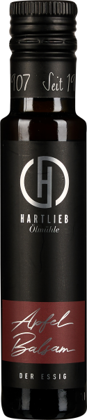 Dunkle Flasche mit elegantem Etikett in Schwarz und Rot.