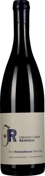 Schlanke, dunkelglasige Weinflasche mit blauer Kapsel und hellem Etikett.