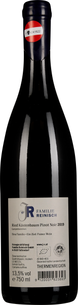 Dunkle Weinflasche mit schlichtem Etikett, glänzendem Verschluss.