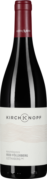 Weinflasche mit rotem Verschluss und eleganter, weißer Etikettengestaltung.