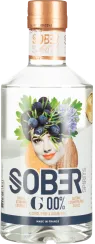 Klarflasche mit kunstvollem Gesichtsmotiv, kupferner Verschluss, grünes Laub und Früchte.