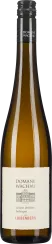 Braune Weinflasche mit schwarzem Schraubverschluss und hellem Etikett.