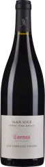 Flasche mit elegantem, dunklem Glas und schlichtem, hellen Etikett; schwarzer Verschluss mit silbernem Emblem.