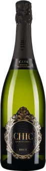 Grüne Sektflasche mit schwarzem Etikett, verziert mit goldenen Ornamenten und Schriftzügen, sowie einer schwarzen Folie und einem elegant gestalteten Flaschenhals.
