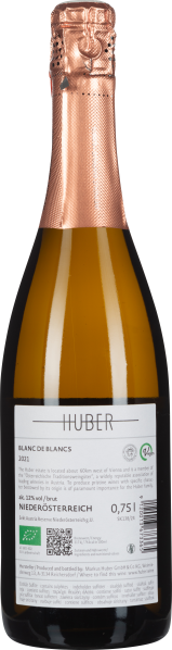 Flasche mit goldener Kapsel und weißem Etikett, eleganter Schaumwein-Look.
